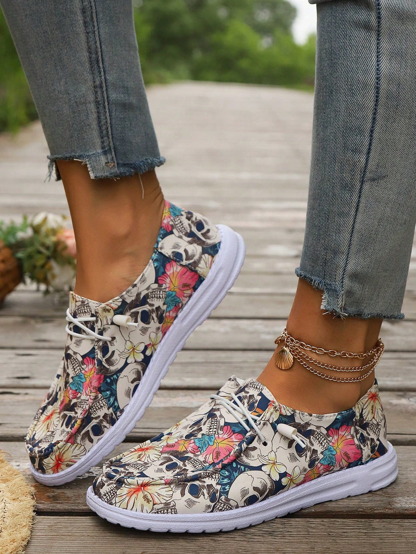 Elevate your autumn and Halloween style with our Hauntingly Stylish loafers. With a unique rose skull patterned print, these loafers add a touch of elegance to any outfit. Expertly crafted for both fashion and function, these shoes are perfect for making a statement. 