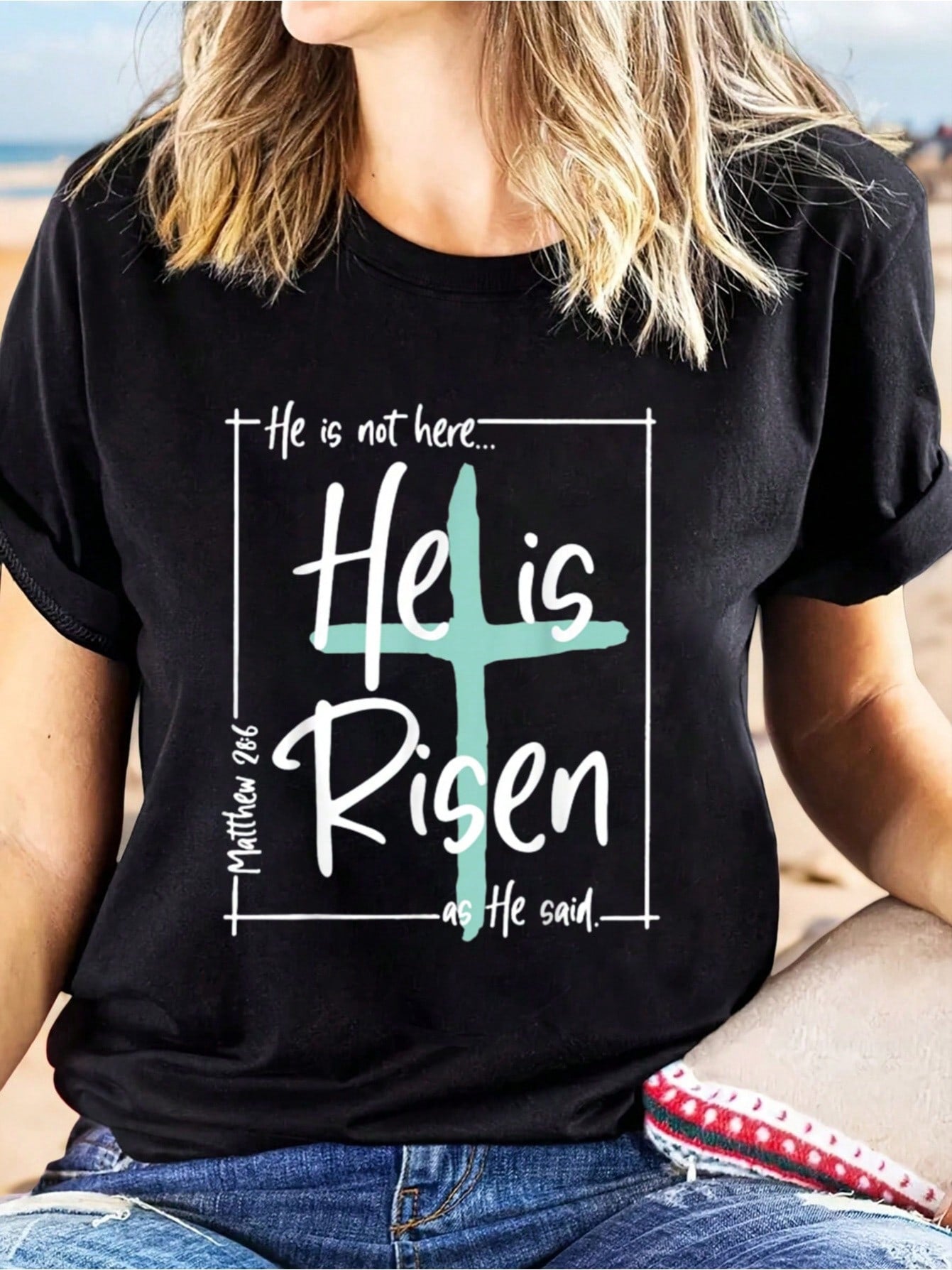 Celebrate the season with this "He Is Risen" women's casual Easter cross tee. Perfect for spring and summer, this tee spreads the message of hope and new life. Wear it to church or brunch with friends and family. Step out in style and share your faith with this playful and comfy tee.