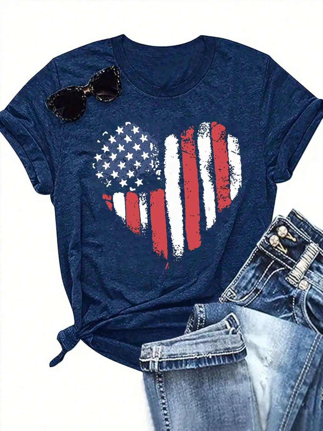 Show your patriotic spirit with our Heart-Shaped American Flag T-shirt! This playful tee combines national pride with feminine flair, perfect for Fourth of July celebrations, parades, or summer barbecues. The soft, breathable fabric keeps you comfortable while you celebrate in style. Make a statement that's both patriotic and fashionable this Independence Day!