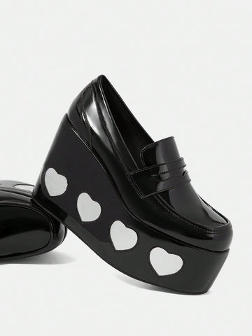 Elevate your style and comfort with our Heart Print Wedge Slip-Ons. Designed for the great outdoors, these shoes feature a heart print design and a comfortable wedge heel for added support. Stay both stylish and comfortable on your next adventure.