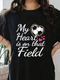 Show off your fierce support for your child on the field with our Heart on the Field T-Shirt! Designed for passionate soccer moms, this adorable shirt features a playful heart graphic and comfortable fit. Perfect for cheering on your little athlete in style.