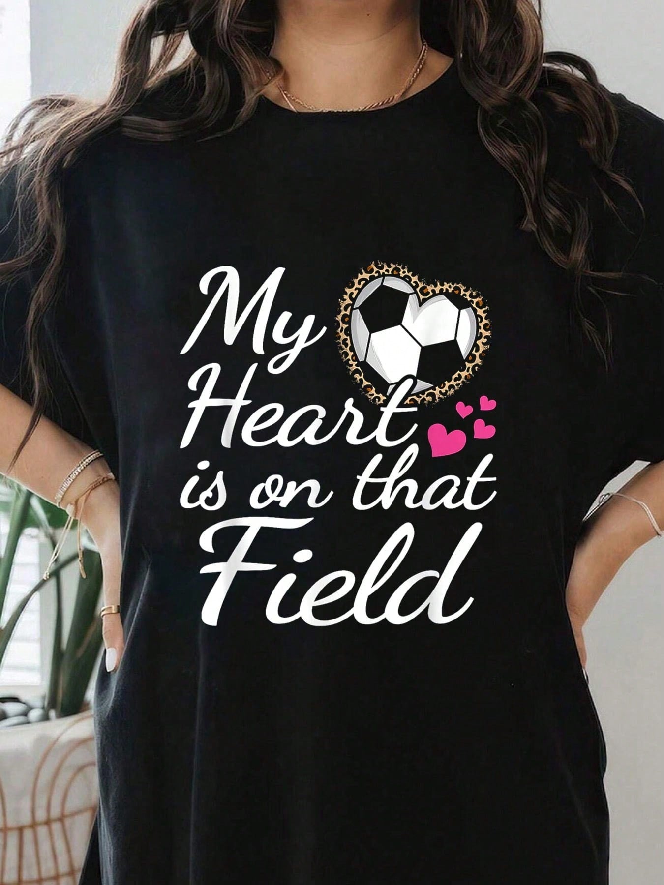 Show off your fierce support for your child on the field with our Heart on the Field T-Shirt! Designed for passionate soccer moms, this adorable shirt features a playful heart graphic and comfortable fit. Perfect for cheering on your little athlete in style.