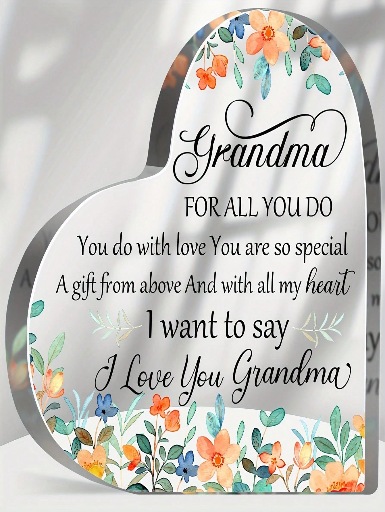 Show love for your grandmother with our Heartfelt Acrylic Heart Plaque. This beautiful tribute is the perfect way to honor her and show your appreciation. Made from high-quality acrylic, it's a lasting reminder of the special bond you share. Give a heartfelt gift that will bring a smile to her face.