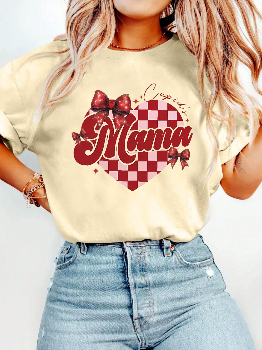 Add some love to your wardrobe with the Heartfelt Chic Mini Tee. Celebrate Valentine's Day all season long with this mom-approved graphic tee. Pair it with your favorite denim for a stylish and playful look. Perfect for spring and summer!