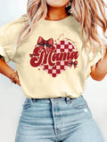 Add some love to your wardrobe with the Heartfelt Chic Mini Tee. Celebrate Valentine's Day all season long with this mom-approved graphic tee. Pair it with your favorite denim for a stylish and playful look. Perfect for spring and summer!