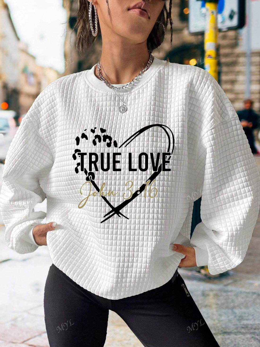 Get cozy and cute with our Heartfelt Comfort sweatshirt! Made with a waffle knit and adorned with a playful Valentine's Day letter heart print, this sweatshirt is perfect for a cozy night in or a casual outing. Spread the love and warmth with this unique piece.