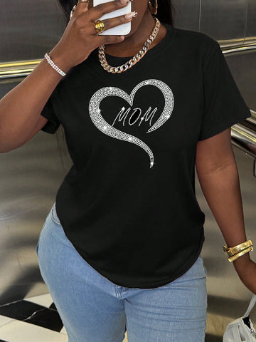Feel elegant and comfortable with our Heartfelt Elegance black t-shirt for new moms. Adorned with sparkling crystals, this round neck top will add a touch of glamour to your everyday look. Perfect for busy moms who want to feel confident and stylish.