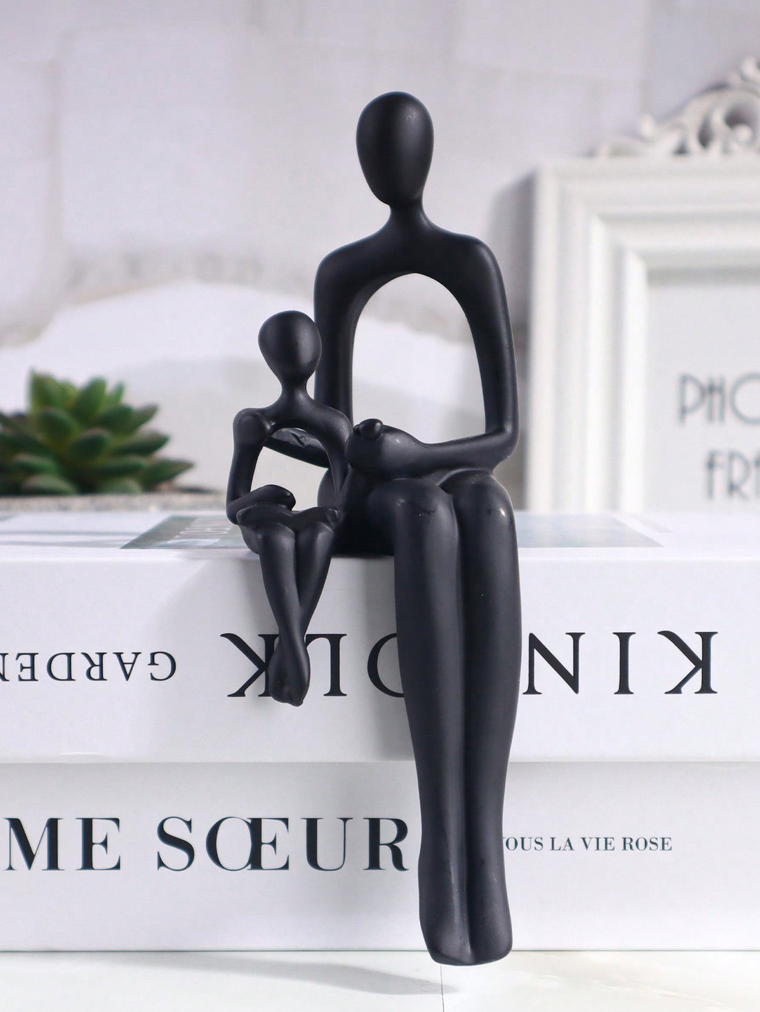 This stunning figurine, "Heartfelt Harmony," beautifully captures the bond and love between a mother and child. Made with expert craftsmanship, it serves as a heartfelt reminder of the special connection between mother and child. Perfect for adding soulful elegance to any home or office decor.
