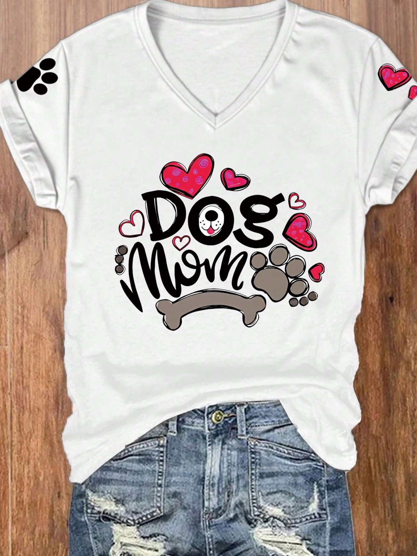 Show your love for your furry friend with the INAWLY Dog Mom Cute Heart tee! This heartfelt v-neck features a playful paw print design, making it the perfect gift for any dog mom this Valentine's Day. Show off your quirky side with this cute and comfortable tee.