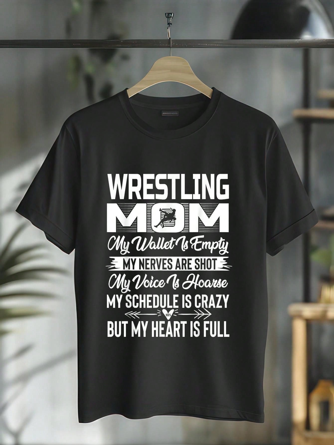 Show your support for your favorite wrestler with our Heartfelt Wrestling Mom Graphic Tee! Made for comfort, this tee is perfect for any casual day. Be proud, be comfortable, be a Wrestling Mom!