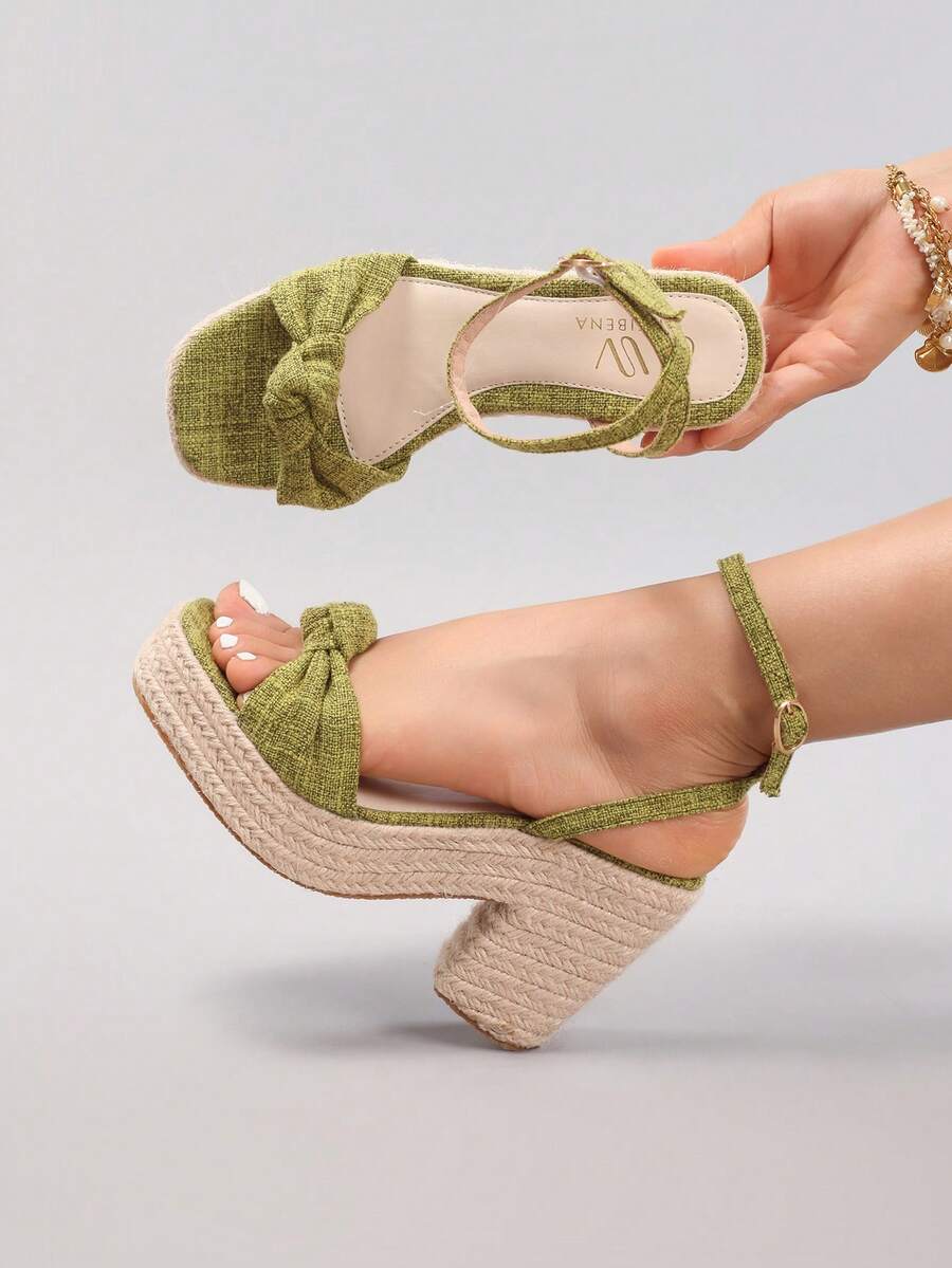 5 media show olive green and natural beige platform sandals with linen-look knotted front strap, ankle strap gold buckle, espadrille rope platform, chunky block heel, open toe. image 1