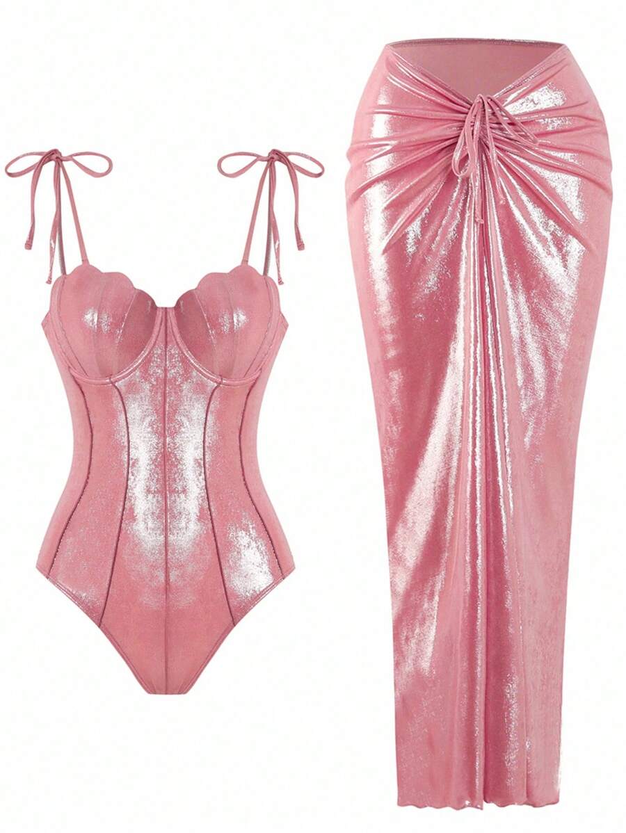 Elevate your summer style with this luxurious pink two-piece swimsuit set. Featuring a push-up shell design that enhances and flatters, this shiny swimwear combines sophistication with comfort. The distinctive fishbone waist detail creates a sculpted silhouette, while delicate bow straps add an elegant finishing touch. Perfect for beach days, poolside lounging, or resort getaways, this high-end set delivers confidence and glamour in every wear.