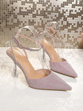 Pink high heel sandals side view showing pointed toe and delicate ankle strap