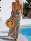 Turn heads at your next beach getaway with our Holiday Bliss Maxi Dress. The vibrant paisley print and strappy back add a playful touch to this backless dress. Perfect for lounging or strolling along the shore, this dress is sure to bring a touch of bohemian charm to your vacation.