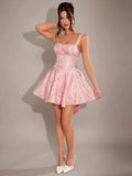 Full front view of baby pink jacquard fit and flare mini dress with structured bodice