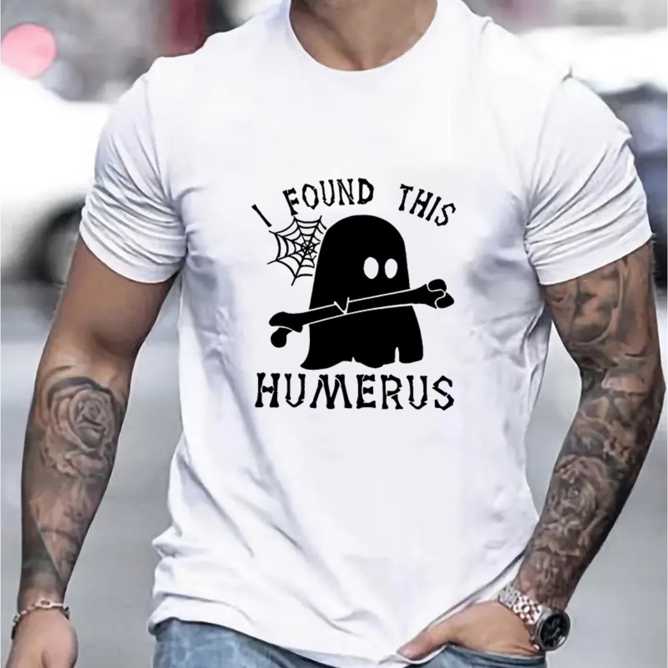 Elevate your summer style with our Humerus Letter Ghost Graphic Print Men's Tee. Expertly designed for a modern and edgy look, this tee features a striking graphic print that will make a statement. Made with high-quality materials, it offers a comfortable fit and is perfect for any casual occasion.