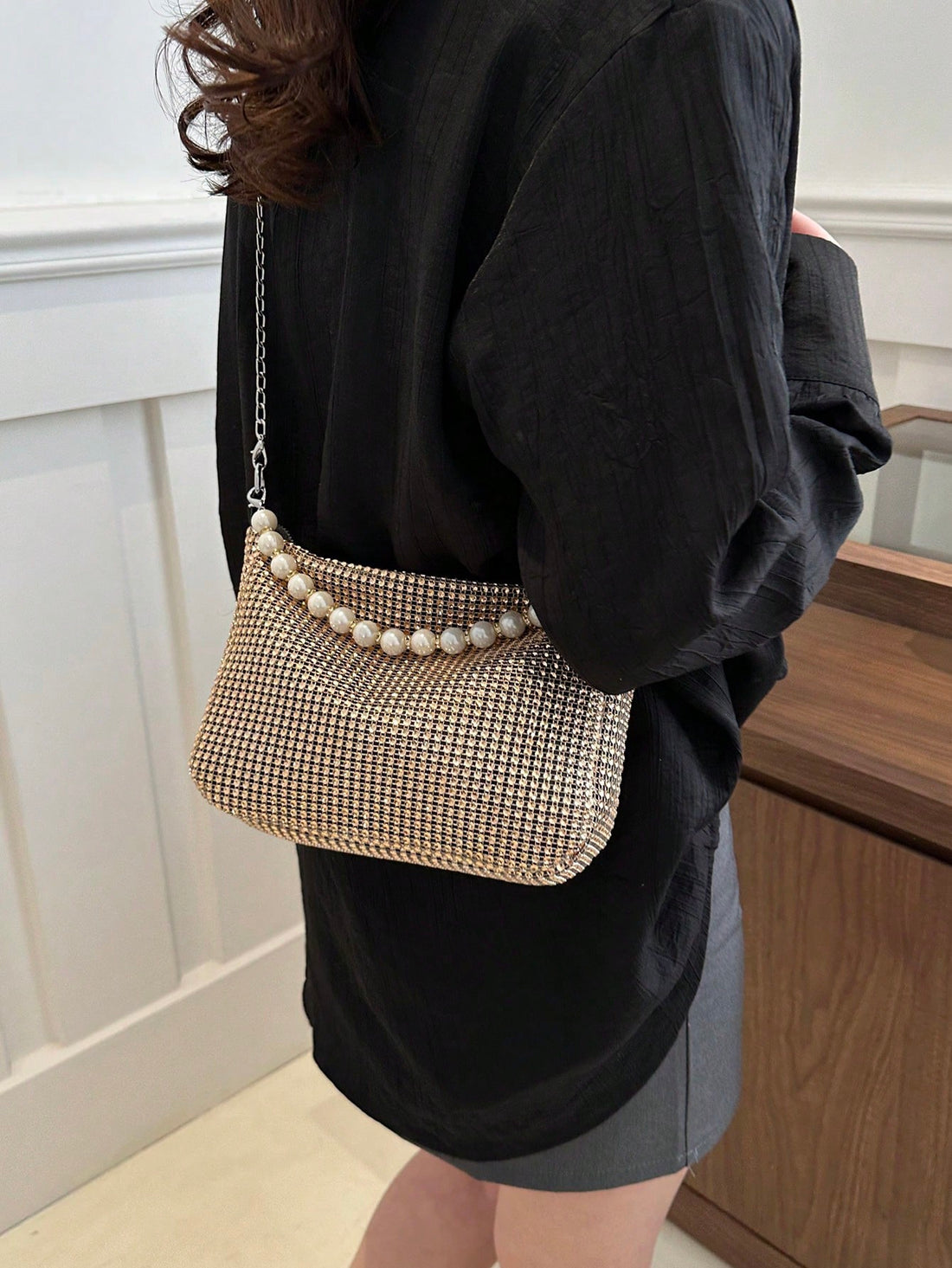Introducing the Rhinestone Glam Shoulder Crossbody Bag, the perfect blend of style and functionality. Adorned with rhinestones and a chic chain decoration, this bag is perfect for any fashion-forward individual. With a large capacity, it's perfect for carrying all your essentials. Upgrade your accessory game with Rhinestone Glam.