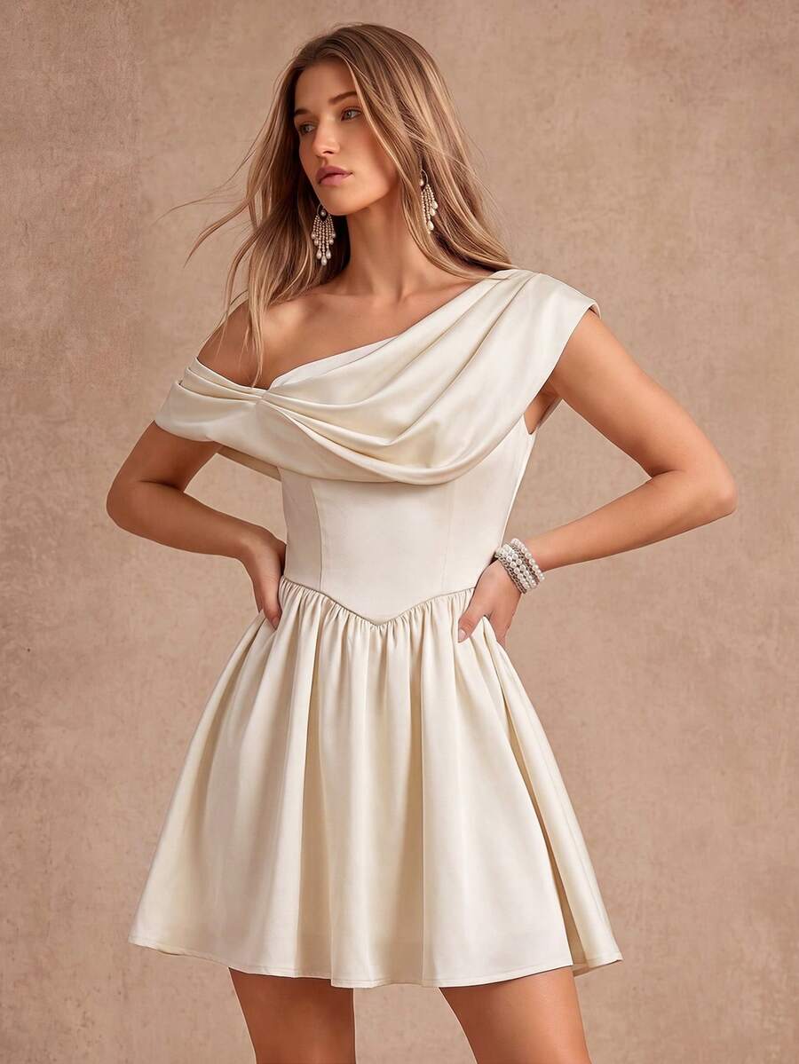 View 1 of ivory one shoulder draped corset mini dress with off-shoulder neckline, V drop waist, gathered skirt, and back zip