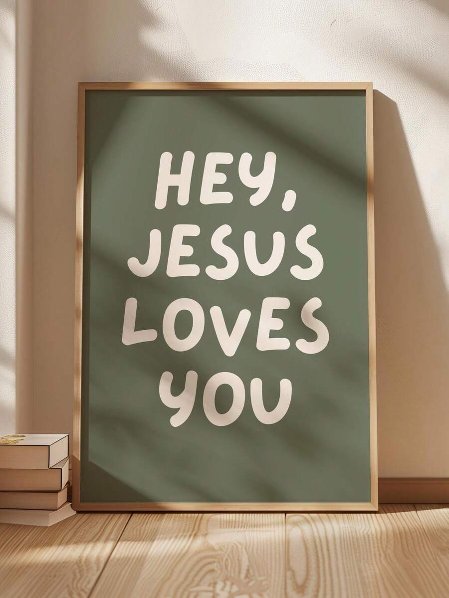 Front view of sage green Jesus Loves You canvas wall art in a light wood frame