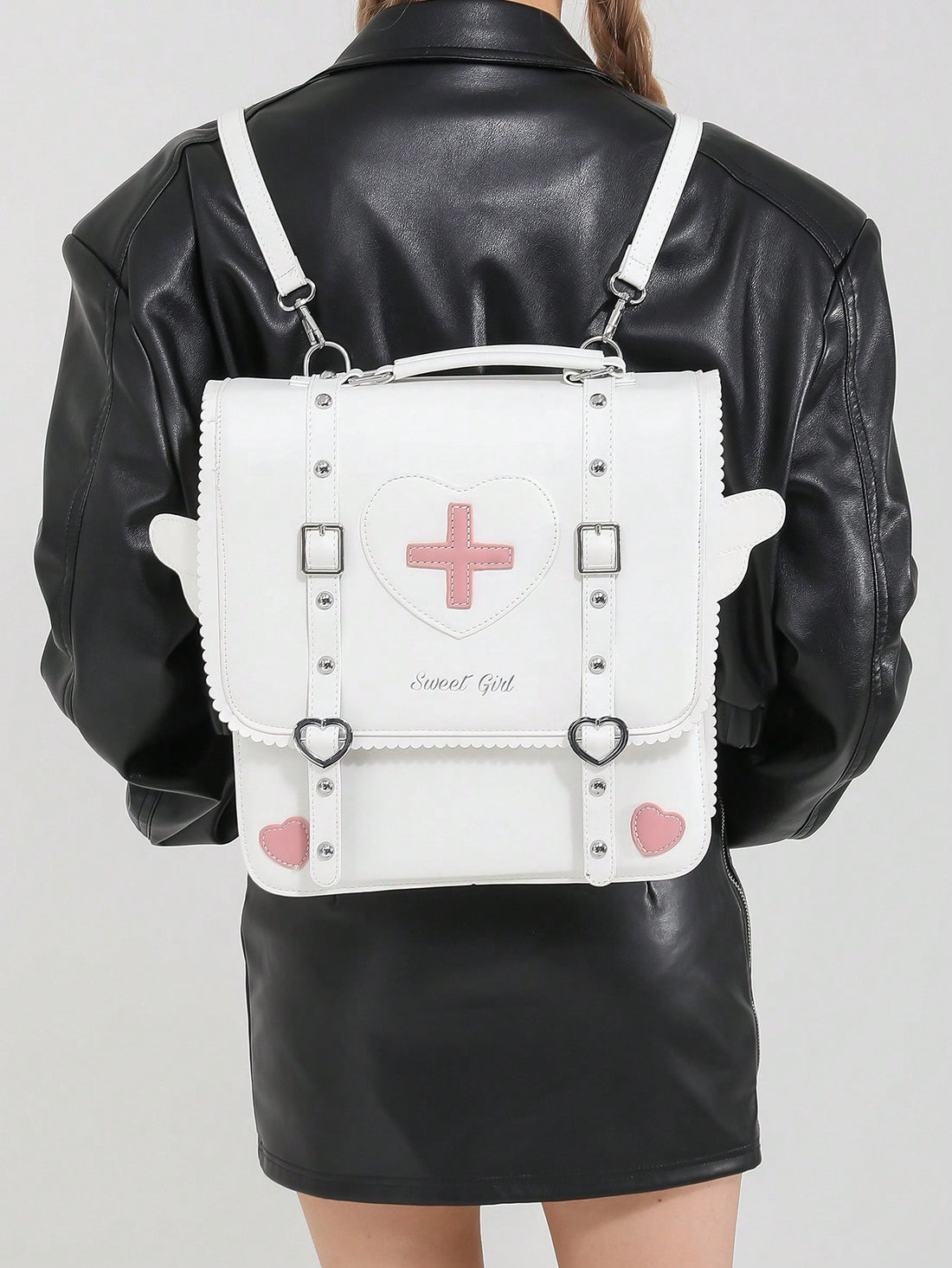 Introducing the Kawaii Angel Wings Backpack - your ultimate goth rock punk flap handbag! Embrace your edgy style with this unique and trendy backpack, complete with kawaii angel wings for a touch of whimsy. With plenty of space and organization, this backpack is both stylish and functional, making it the perfect accessory for any outfit.