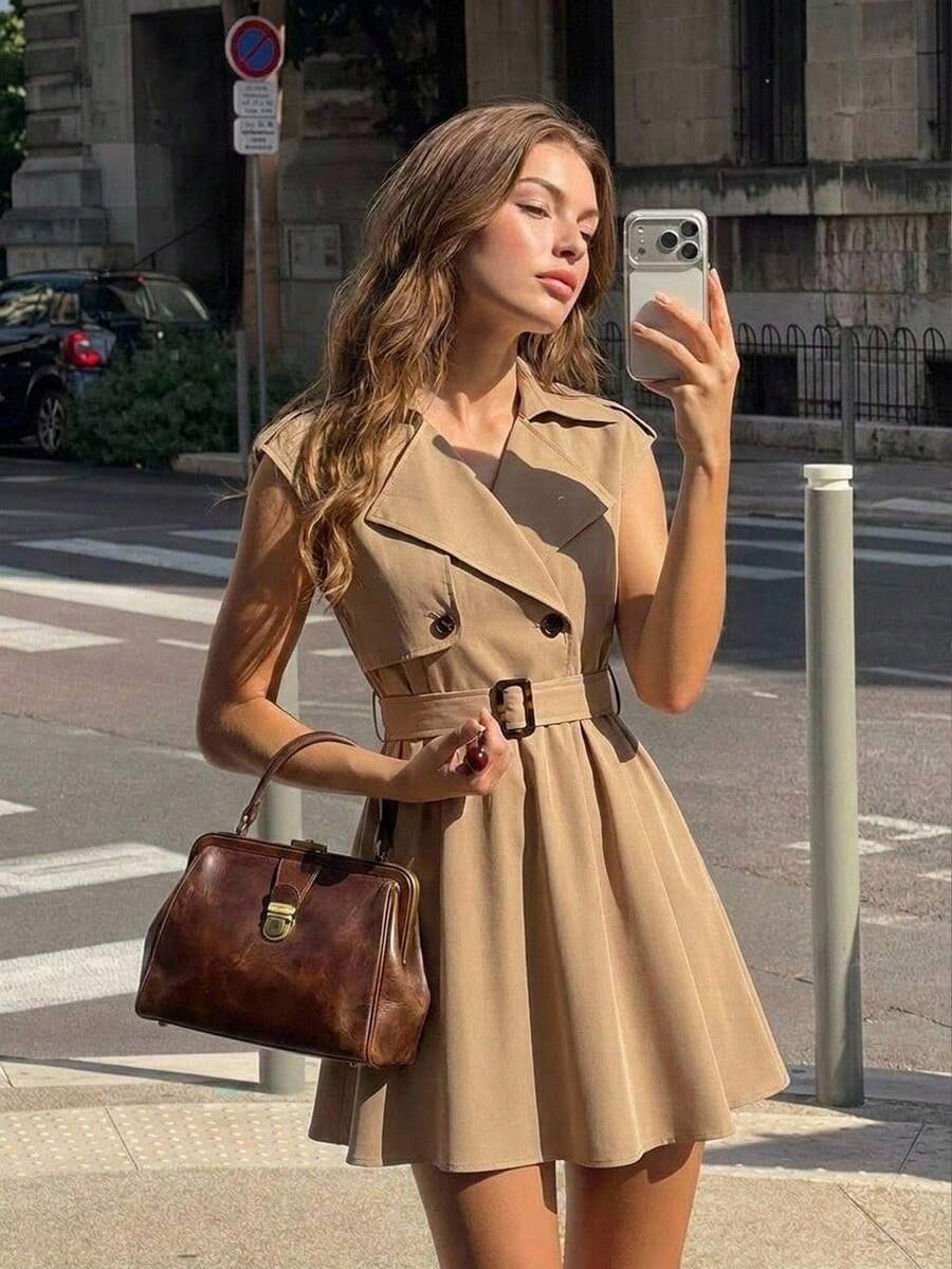 Front view of khaki sleeveless belted mini dress with lapel neckline