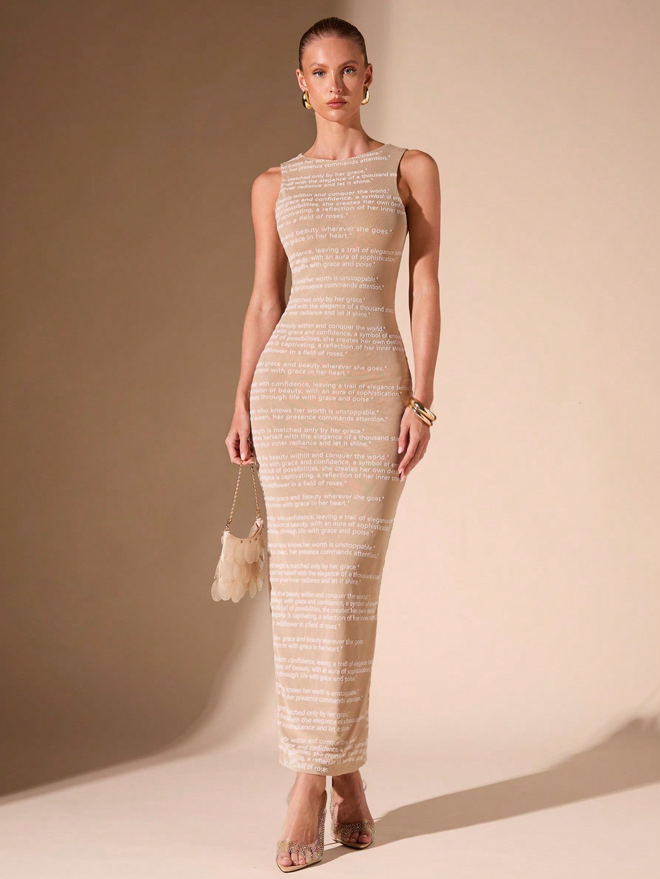 Get ready to turn heads this summer in our Khaki Sleeveless Bodycon Dress! Combining a playful letter print with sheer mesh panels, this dress is perfect for effortless summer style. The bodycon fit will flatter your figure, while the breathable fabric will keep you cool and comfortable. Get ready to slay all day in this quirky and fun dress!