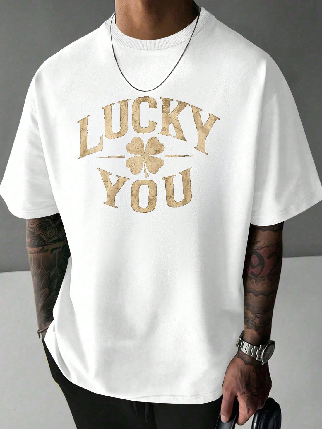 Add some luck to your wardrobe with our LUCKY YOU t-shirt. Made from comfortable cotton, this t-shirt features a playful four-leaf clover design. Perfect for those who like to add a bit of whimsy to their style. (Just don't forget to wear your lucky shirt on game day!)