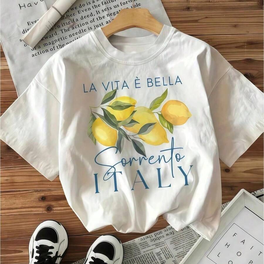 Front view of white Sorrento lemon graphic cotton T-shirt with Italian lettering