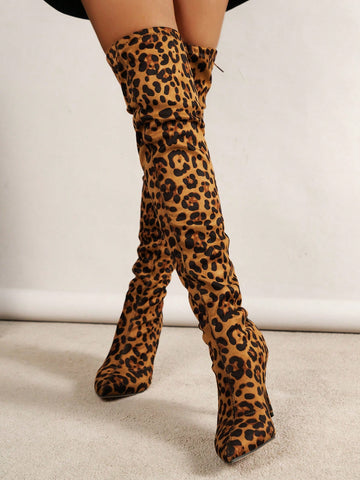 Step out in style this autumn and winter with our Leopard Chic knee-high boots. These sleek, chunky-heeled boots are perfect for any fashionable woman. Let your inner fashionista roam free with our stylish leopard print design. These boots are both functional and trendy, making them a must-have for the cooler seasons.