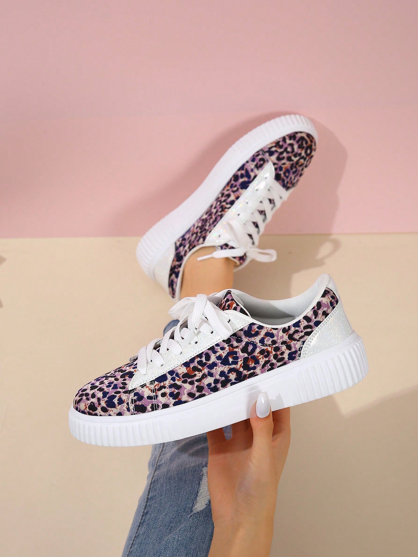 These Leopard Lace-Up Skate Shoes are perfect for all your festive and fashionable Christmas parties. With their eye-catching leopard print and chunky sneaker design, you'll be the talk of the town. Plus, the lace-up feature ensures a secure fit and comfortable wear all night long. Make a statement and elevate your style with these must-have shoes.