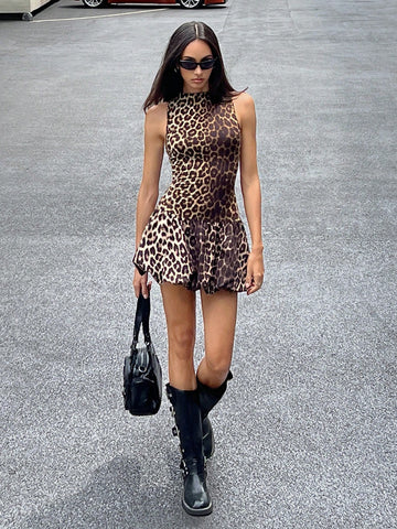 Make a bold statement with our Leopard Love backless bud dress. The perfect choice for a seductive summer appearance, this dress features a unique, eye-catching design and comfortable fit. With its backless style, you'll turn heads and feel confident in your own skin.