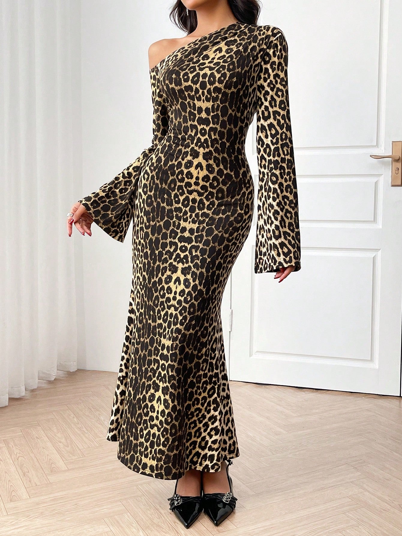 Unleash your wild side with this Leopard Print Asymmetric Neck Mermaid Dress! The unique neckline and mermaid silhouette add a touch of elegance to this eye-catching piece. Perfect for any special occasion, this dress will have you feeling fierce and fabulous all night long.