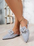 Slip into style with these adorable light blue bowknot mule slippers! The vertical stripes add a fun touch to these comfortable and stylish plus size slippers. Perfect for both indoor and outdoor leisure activities.