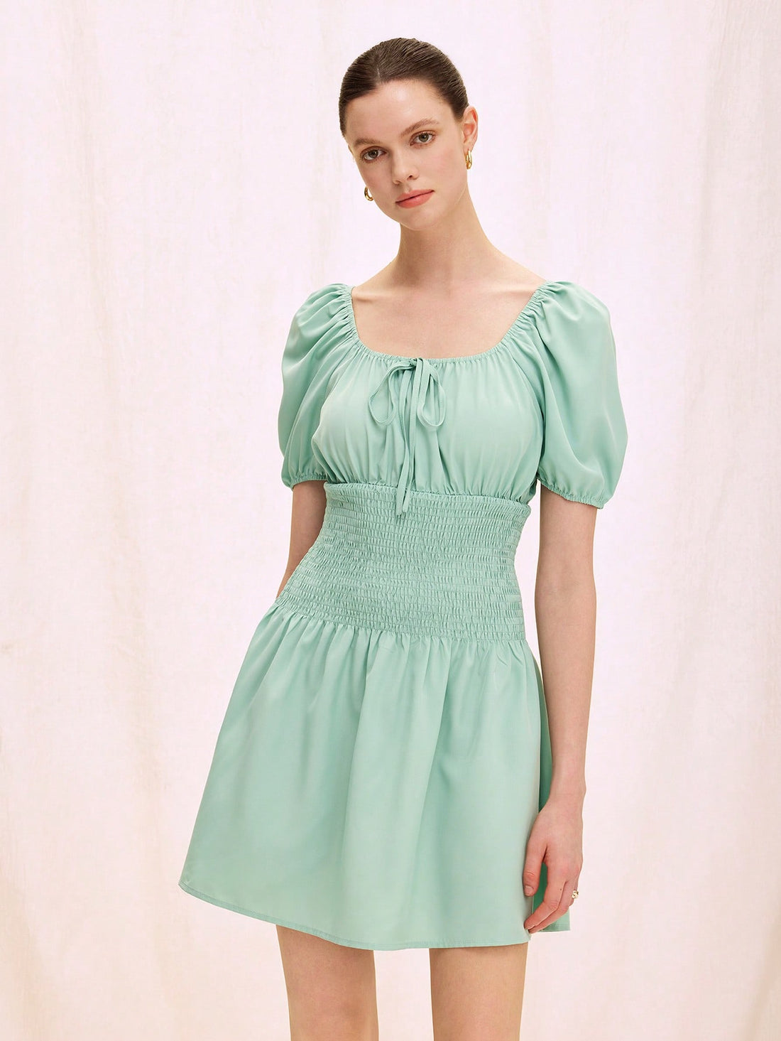 Light Green Puff Sleeve A-Line Dress with Square Neck and Elastic Waist Elevate your everyday wardrobe with this sophisticated light green dress, designed for both comfort and style. The structured square neckline creates a flattering silhouette, while voluminous puff sleeves add contemporary flair. An elastic waist provides a customizable fit that moves with your body, and the graceful A-line cut offers flattering proportions for various body types. Perfect for casual outings, brunch, or weekend gatherings
