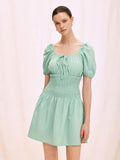 Light Green Puff Sleeve A-Line Dress with Square Neck and Elastic Waist Elevate your everyday wardrobe with this sophisticated light green dress, designed for both comfort and style. The structured square neckline creates a flattering silhouette, while voluminous puff sleeves add contemporary flair. An elastic waist provides a customizable fit that moves with your body, and the graceful A-line cut offers flattering proportions for various body types. Perfect for casual outings, brunch, or weekend gatherings