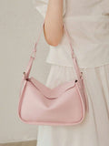 Add a soft, modern touch to your everyday wardrobe with this light pink pillow shoulder bag for women. Designed with a lightweight silhouette and a plush, cushioned look, this handbag offers the perfect balance of comfort, style, and practicality for daily use.