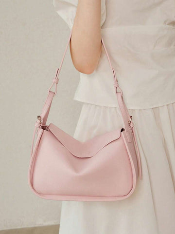 Add a soft, modern touch to your everyday wardrobe with this light pink pillow shoulder bag for women. Designed with a lightweight silhouette and a plush, cushioned look, this handbag offers the perfect balance of comfort, style, and practicality for daily use.