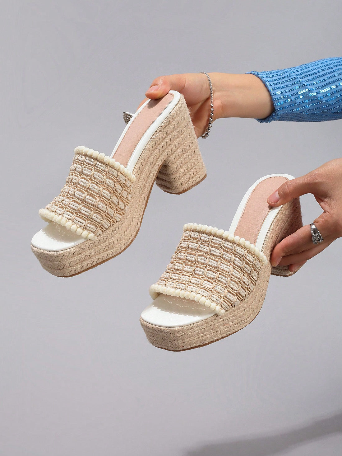 Step into summer with these breezy white rope wedge platform sandals that make comfort feel like a luxury. The lightweight design keeps your feet happy all day long, while the elevated wedge heel adds just the right amount of height without the fuss. Soft rope detailing brings a relaxed, beachy vibe to any outfit—from casual beach days to effortless weekend adventures. Slip them on and let your feet do the talking.