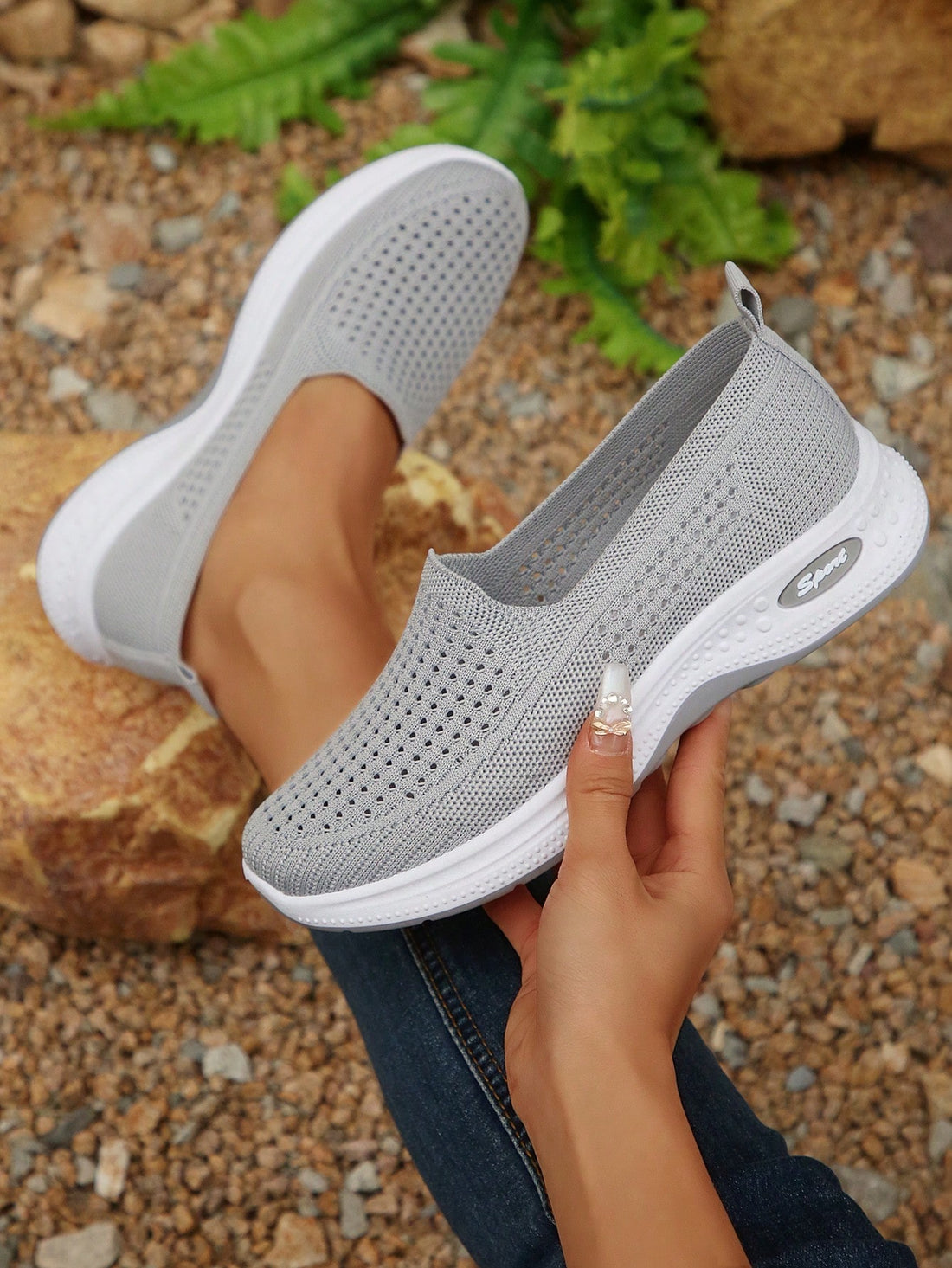 Step into style with our Lightweight Mesh Slip-On Sports Shoes for Women. These versatile casual sneakers provide breathability and comfort, perfect for any active lifestyle. With a lightweight design, you'll feel like you're walking on air. Take on any adventure with these must-have shoes!