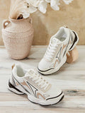 Front three-quarter pair view of white black and beige chunky mesh sneakers