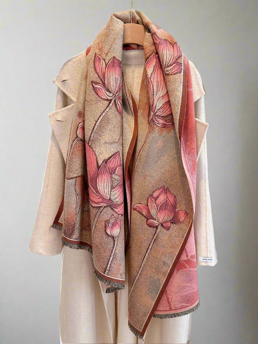 Introducing our luxurious Lotus Floral Bliss Imitation Cashmere Scarf, the must-have fashion accessory for the Fall/Winter season. Made with soft and durable imitation cashmere, this versatile scarf features a beautiful lotus floral design that will elevate any outfit. Stay warm and stylish with this essential piece.