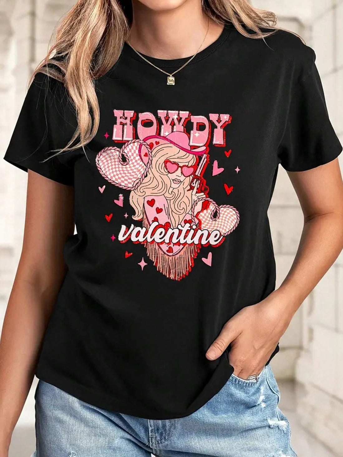 This versatile tee is perfect for any occasion, adding a touch of whimsy to your wardrobe with its fun love letter graphic. Whether you're dressing up or down, this casual top is sure to make a statement and show off your playful side.