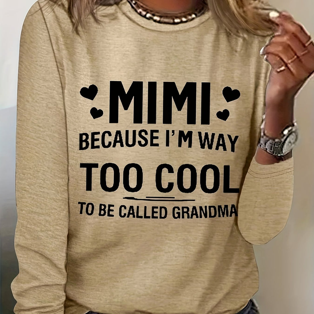 This long sleeve t-shirt features a unique love letter heart neckline, adding a touch of romance to your casual look. Made for women, this t-shirt is both comfortable and stylish, making it a versatile addition to any wardrobe. Show off your love for fashion with this must-have piece.