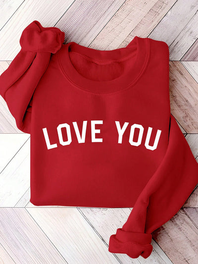 Spread love and good vibes with our Love Vibes Only: Cozy Valentine’s Day Sweatshirt. Stay warm and stylish with this ultra-comfy sweatshirt, perfect for cuddling up with your valentine. Spread the love this Valentine's Day!