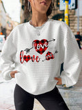 Show off your love and comfort with this adorable Valentine's Day sweatshirt. Made with soft and cozy material, it's perfect for cuddling with your sweetheart or lounging around on a chilly February day. Spread love and stay cozy with Love in Comfort!