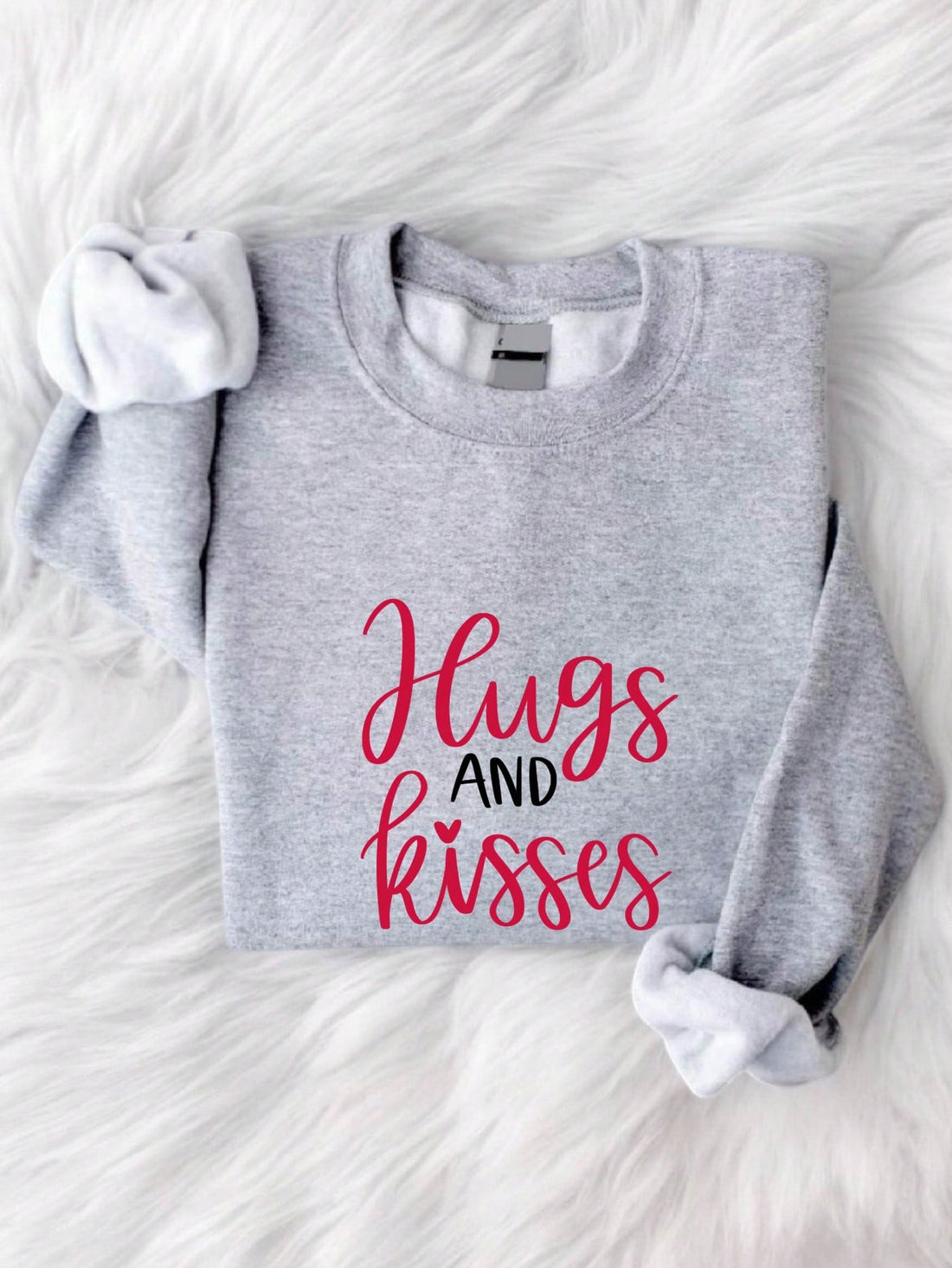 Stay cozy and stylish this Valentine's Day with our Love in Comfort sweatshirt. Featuring a unique slogan print, it's perfect for expressing your love in a playful and quirky way. Made from comfortable material, this sweatshirt will keep you warm and in style. (Feel the love and comfort with our Valentine's theme sweatshirt!)