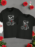 This men's black crew neck t-shirt features a cute Valentine's Day bear and heart graphic, perfect for showing your love in style. Made with high-quality materials, this t-shirt is sure to be a wardrobe favorite. Give your significant other a sweet gift they'll adore!