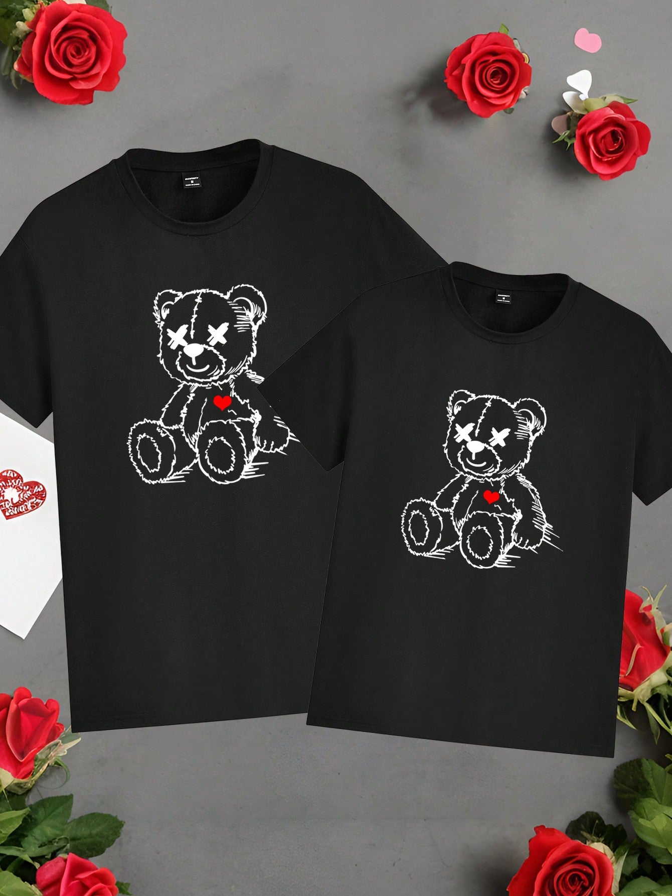 This men's black crew neck t-shirt features a cute Valentine's Day bear and heart graphic, perfect for showing your love in style. Made with high-quality materials, this t-shirt is sure to be a wardrobe favorite. Give your significant other a sweet gift they'll adore!