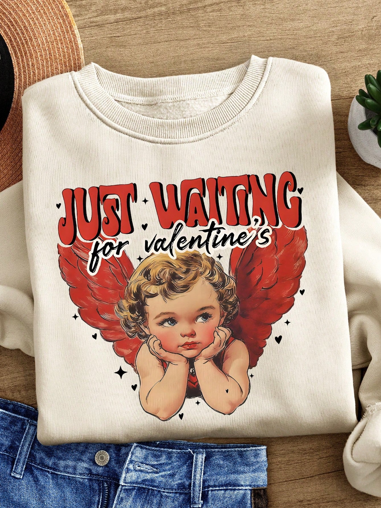 Get ready to feel the love in the air with our cozy and cute Valentine's Day sweatshirt! Perfect for a romantic date night or a cozy night in, this sweatshirt will keep you warm and stylish. Spread love and warmth this holiday with our Love in the Air sweatshirt.