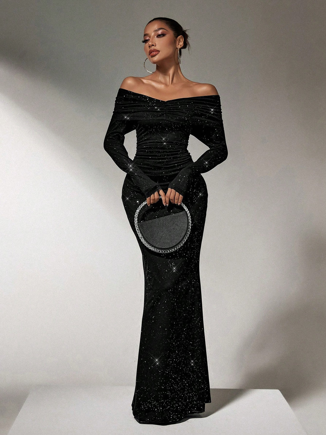 Step into the spotlight with this Luminous Black One-Shoulder Fishtail Prom Dress! Designed to turn heads at holiday parties and sparkle through New Year's Eve, its sleek silhouette hugs your curves and flares out with a dramatic fishtail hem. The one-shoulder style adds a flirty twist, making every move feel effortlessly glamorous. Get ready to dance the night away in style and shine like the celebration queen you are!